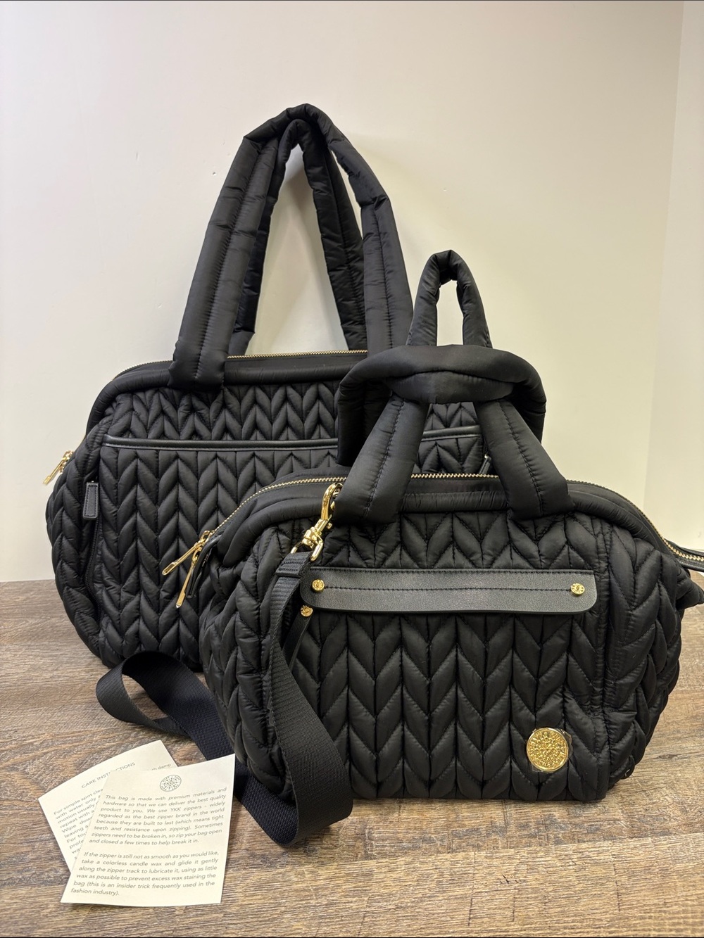 HAPP Paige Carryall Diaper Bag + Paige Mini Black Quilted 2-Piece Set
